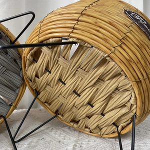 Handwoven straw planters on metal stands in natural and gray finishes for home decor