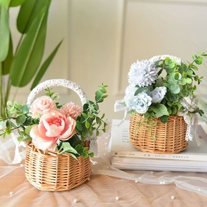 Handmade wicker flower baskets with lace handles featuring pink and blue silk peonies