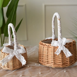 Handwoven wicker flower basket set with lace handles and decorative white bows for florist