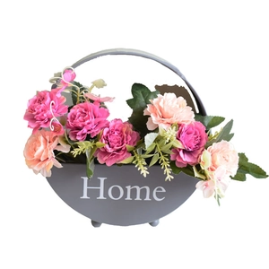 Circular iron wall planter with pink peony silk flowers and Home text decoration