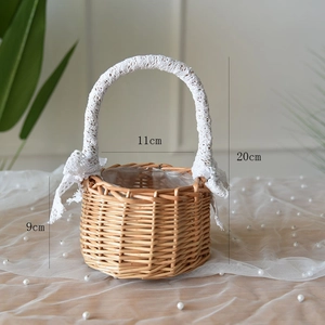 Detailed view of handmade willow basket with white lace handle and precise dimensions