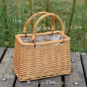 Detail showing the dimensions and waterproof lining of the handmade woven wicker basket bag