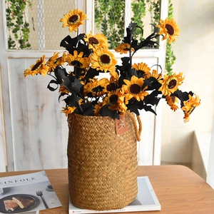 Handwoven straw basket with dark sunflowers, perfect for vintage autumn home decoration