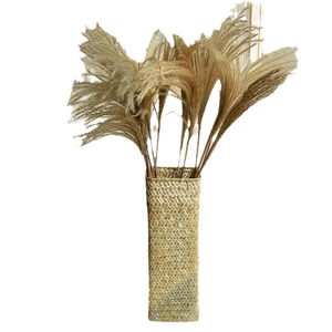Natural dried pampas grass bouquet in a handmade rectangular woven seagrass vase