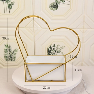 Golden heart-shaped metal floral basket with precise dimensions and white inner basin