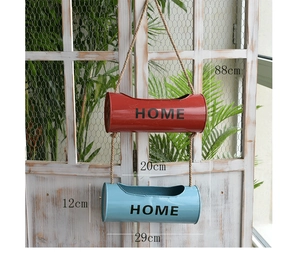 Detail view of double-layer hanging metal planter with jute rope and dimensions