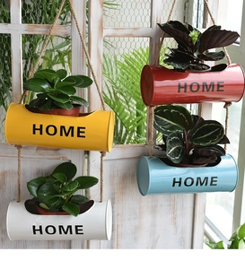 Hanging metal bucket planters in four colors with hemp rope and HOME text detail