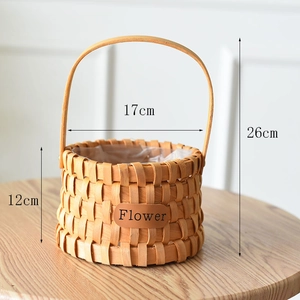 Detail view of woven flower basket measuring 17cm with inner plastic waterproof lining