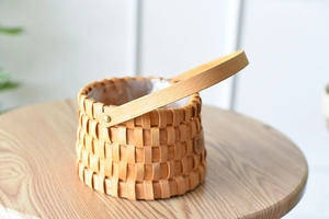 Macro detail of hand-woven wicker basket with waterproof lining and flower label