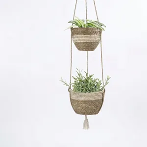 Double-tier woven hanging planter with jute ropes, white stripes, and tassel decor