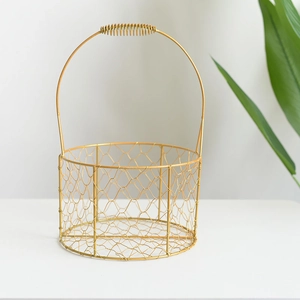 Golden round wire gift basket with hexagonal mesh and tall handle for wedding party