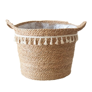 Nordic woven seagrass flower pot with white tassels and handles for indoor plants