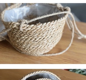 Detail of hanging seagrass planter with waterproof plastic liner and sturdy hemp rope