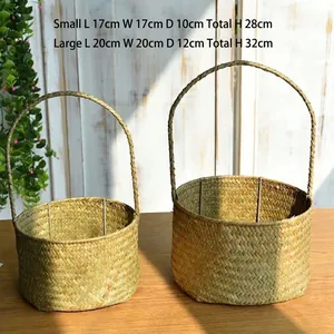 Natural seagrass woven flower basket set with round handle and rustic handmade texture
