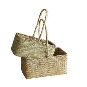 Handwoven seagrass flower basket with handles for storage and decorative gift packaging