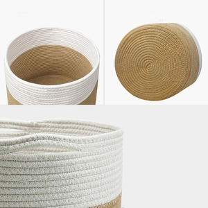 Modern woven cotton rope storage basket with two-tone design and built-in handles