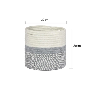 Detail view of woven cotton rope basket with dimensions showing 20cm height and width