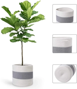 Detailed close-up of woven cotton rope plant basket featuring grey and white striped texture
