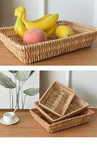 Three-piece set of woven rattan storage baskets for fruits and snacks in natural finish