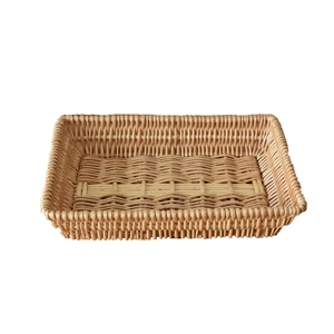 Handwoven rectangular rattan storage basket for fruit and snack organization in natural wood color