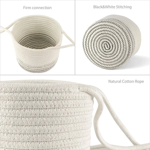 Natural cotton rope hanging basket with black and white stitching and firm handles