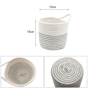 Macro detail of a 15cm cylindrical cotton rope storage basket with black wave stitching