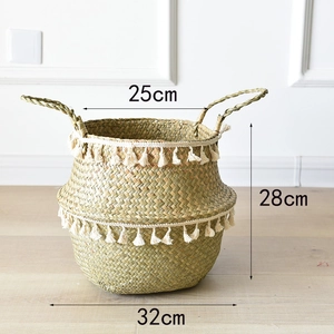 Detailed view of woven seagrass basket with white tassels and size dimensions