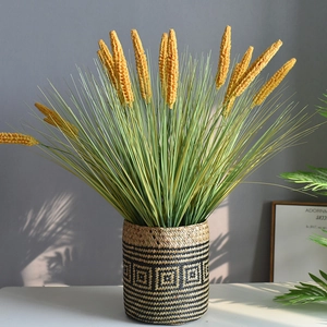 Handwoven basket with vibrant yellow artificial foxtail grass bouquet for home decor