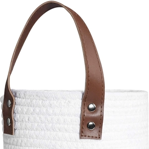 Cotton rope wall hanging basket with dark brown leather handle and metal rivets