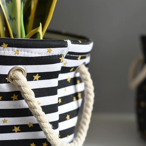 Nordic canvas plant pot with black white stripes, gold stars and thick rope handles