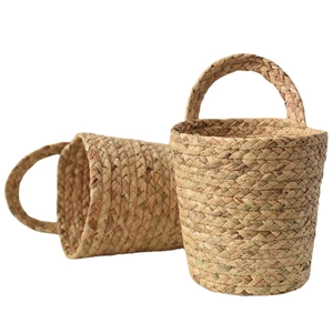 Set of two handcrafted seagrass woven hanging baskets with handles for home storage