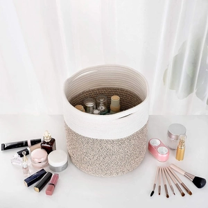 Modern two-tone woven cotton rope plant basket with handles for home storage and decor