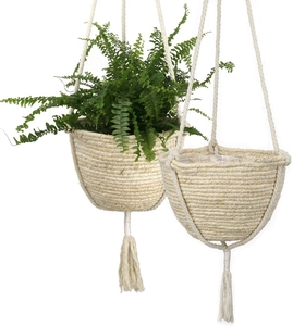 Detail of hand-woven 25cm cattail hanging planter with waterproof lining and decorative tassels