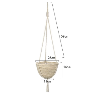 Close-up of 25cm woven seagrass hanging planter with natural fiber ropes and tassel detail