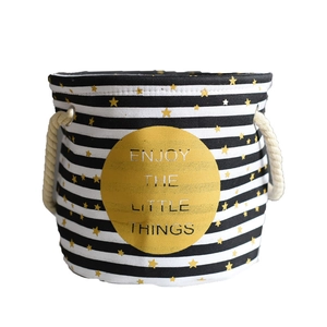 Round linen fabric planter with gold star print and cotton rope handles for home decor