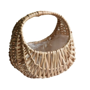 Handwoven wicker flower basket with handle and waterproof liner for floral arrangements