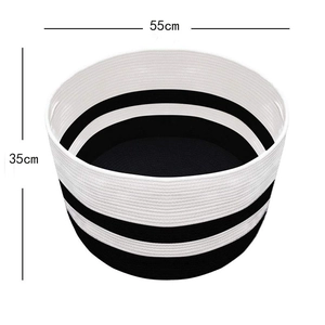 Detail view of woven cotton rope laundry basket with size dimensions 55cm diameter by 35cm height