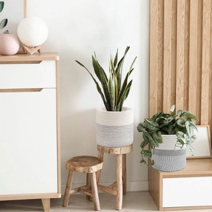 Modern white and grey cotton rope woven baskets for plants and home organization