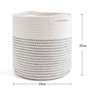 Detail of woven cotton rope plant basket showing 20cm height and two-tone texture
