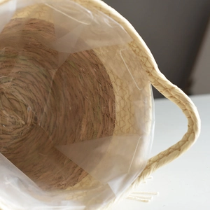 Handwoven seagrass plant basket with handles and waterproof lining for indoor gardening