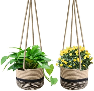 Detailed macro view of dual-color woven plant hangers crafted from natural hemp rope material