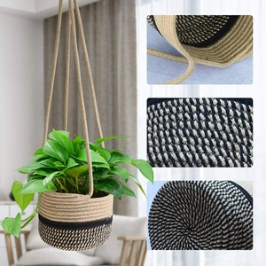 Hanging handmade jute plant basket with a two-tone woven design and sturdy cotton ropes