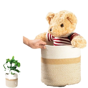 Handwoven two-tone cotton rope storage basket with handles for plants or toy organization