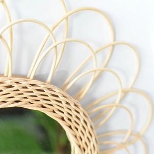Handcrafted round rattan wall mirror with sunburst woven petal frame for home decor
