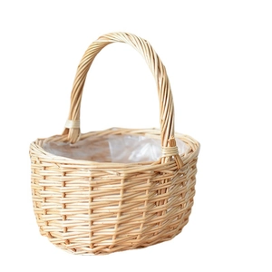 Handwoven wicker flower basket with handle and waterproof liner for plants and storage