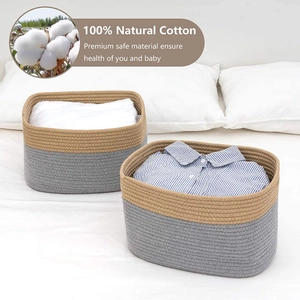 Detail of woven cotton rope basket showing 100% natural fiber texture in grey and brown