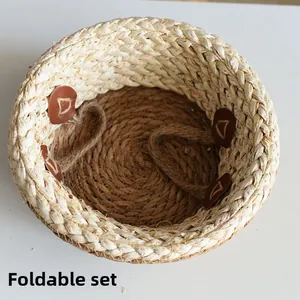 Detail view of foldable hand-woven seagrass basket with natural fiber and leather buckle
