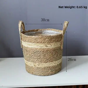Detail view of woven flower basket with plastic lining and size marked 30x26 cm