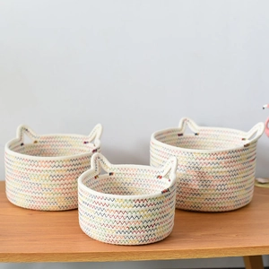 Three-piece set of cat-ear woven storage baskets with colorful zigzag stitching