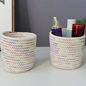 Colorful woven cotton rope storage basket set with rainbow zigzag stitching for desk organizing